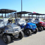 Row of ClubCar Golf Carts